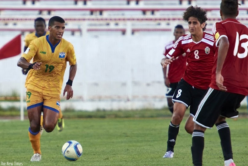 Amavubi striker Rushenguziminega, left, seen here playing against Libya on Friday, is still looking for his first international goal. (Courtsey)