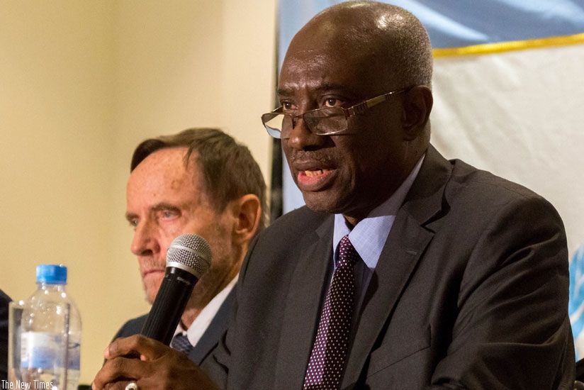 Judge Boubacar Jallow addresses the media in Kigali as Judge Prusse looks on yesterday. (Timothy Kisambira)