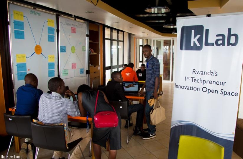 Software developers at K-Lab, a tech innovation hub, in Kigali. (Timothy Kisambira)