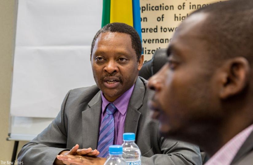 Prof. Anastase Shyaka, the chief executive of Rwanda Governance Board, explains to journalists some of the key issues tackled by citizens during the Governance Month. (Doreen Umutesi)