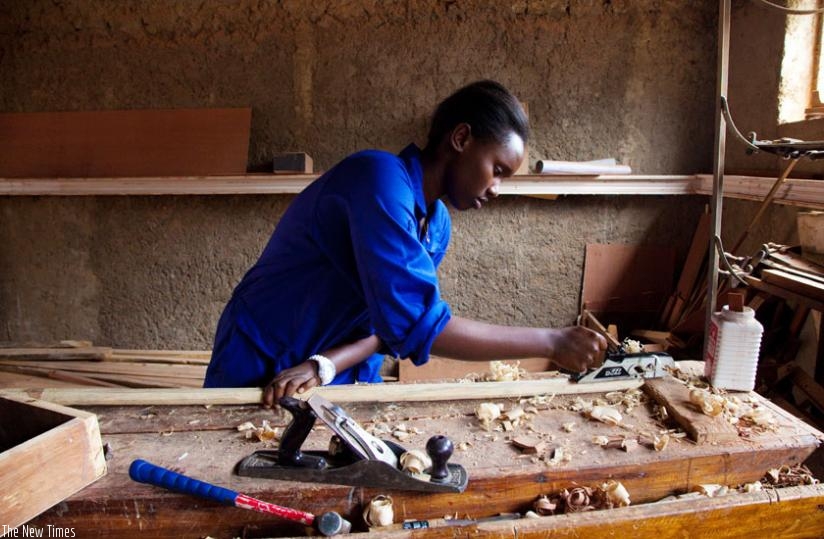 A student files wood at IPRC workshop in Kicukiro. (File)