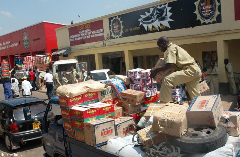 Labourers at Quartier Mateus offload goods from trucks. (File)