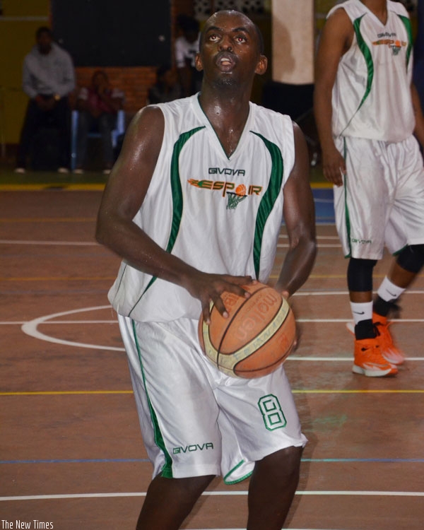 Former Espoir captain Aristide takes aim for a free-throw during the Zone V Club Championship in Kigali last month. (File)