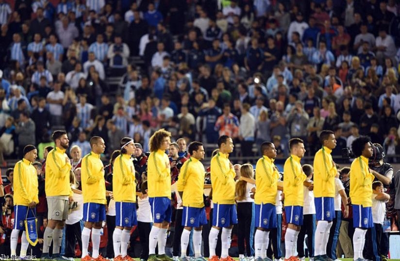 The Brazil team observe a minute's silence for the victims of the Paris attack ahead of their WCup qualifier with Argentina. (Net photo)