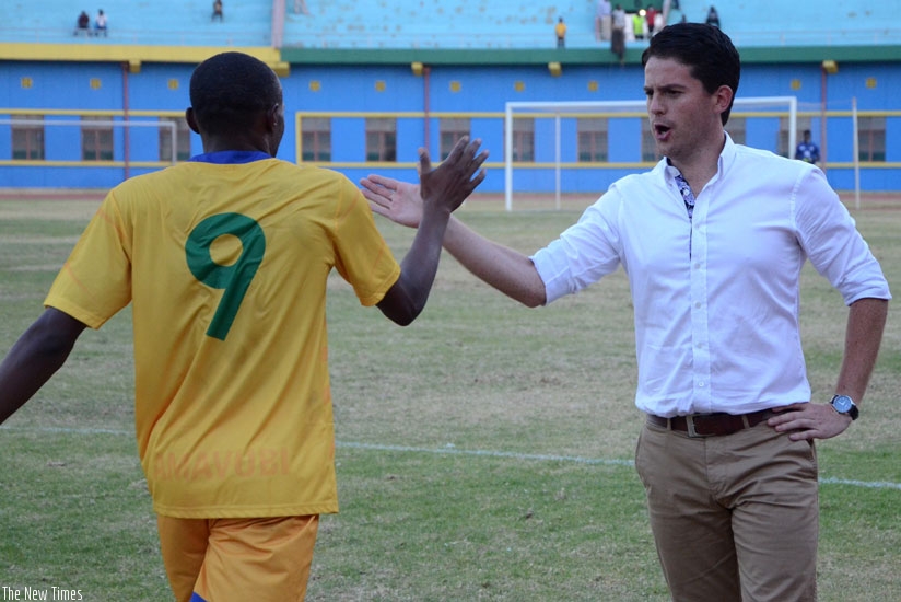 Tuyisenge, seen here being congratulated by McKinstry after scoring against Ethiopia in a friendly in September, was on target again on Saturday. (Sam Ngendahimana)