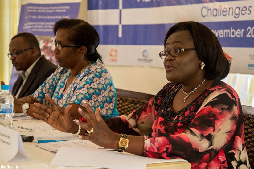 Anyangwe (R), Dusabe (C) and Bulindi address the media. (All photos by Doreen Umutesi)