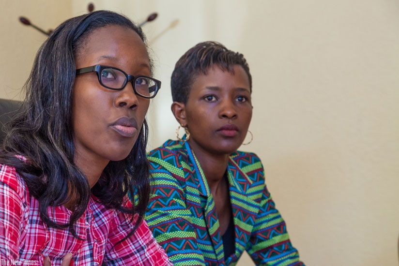 Development Women Empowerment Officer at National Women Council Yvette Muteteri (L) speaks during the news conference as Kamanzi Masabo looks on, in Kigali, on Monday. (Faustin Niyigena)