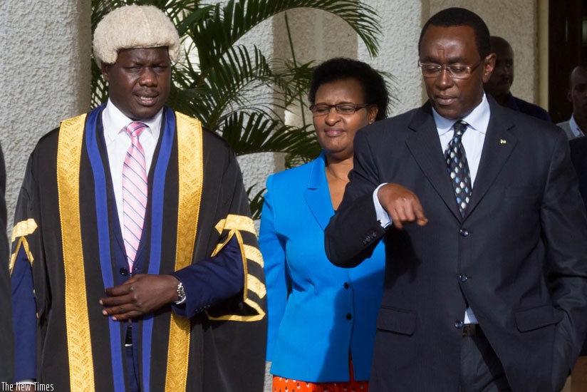 EALA Speaker Daniel Kidega (L), Speaker of Rwandan Parliament Donatille Mukabalisa (C) and Senate president Bernard Makuza chat after the opening of the Assembly sitting in Kigali yesterday. (All photos by Timothy Kisambira)