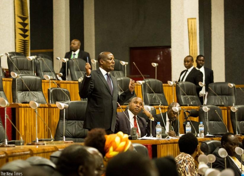 MP Adbi Ogle moves the motion at parliament in Kigali, yesterday. (Timothy Kisambira)