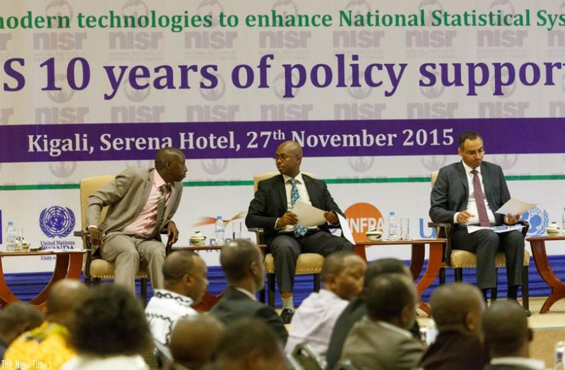 L-R; David Nkusi, the head of corporate services at the National Institute of Statistics of Rwanda (NISR), Murangwa and Alemu at the celebrations to mark African Statistics Day in Kigali yesterday. (Timothy Kisambira)