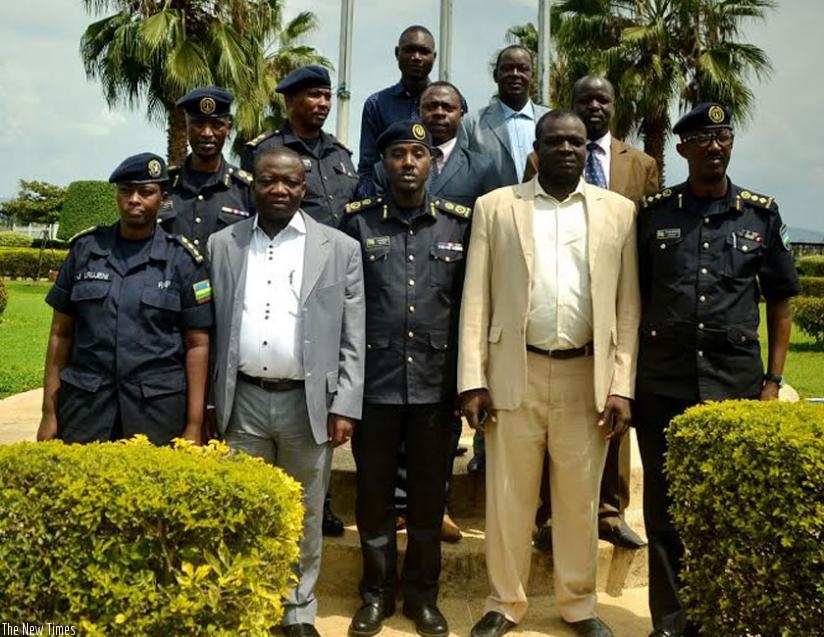 ACP Theos Badege (C), the Commisioner for Criminal Investigation Department, briefed the six officials from Burkina Faso. (Courtesy)