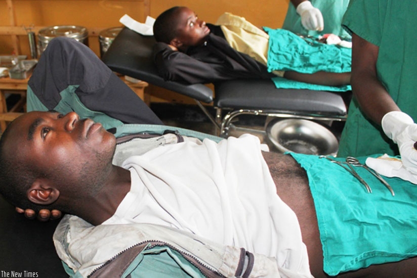 Youth undergo circumcision at Kanombe Military Hospital, last year. (Timothy Kisambira)