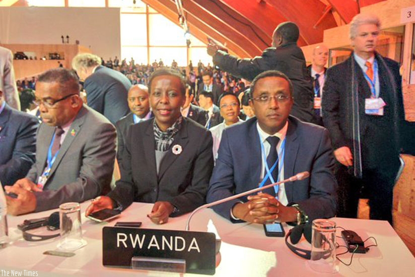 Minister Biruta (R) and Minister Mushikiwabo (C) led the Rwandan delegation to the Paris Climate Change conference. (Courtesy)