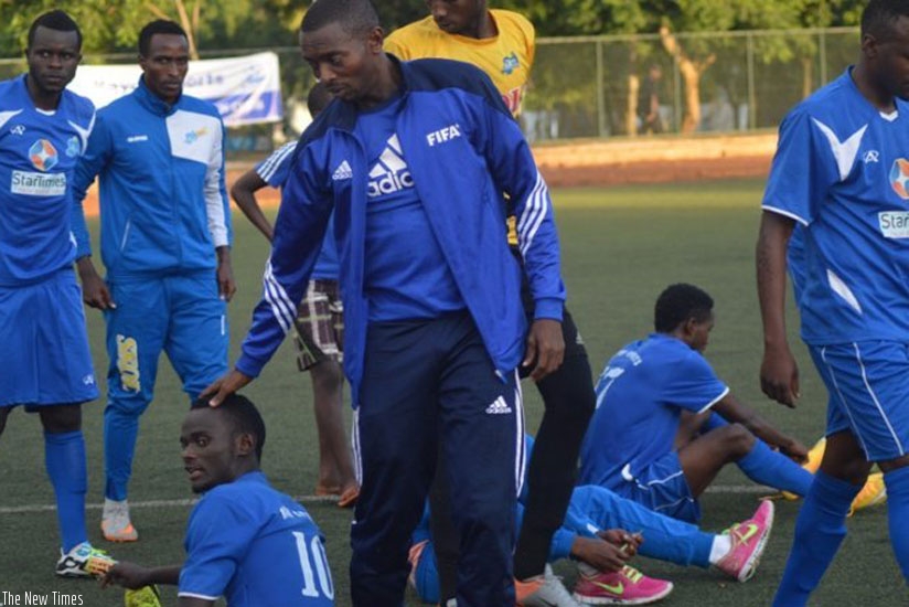 Djuma Masudi seen talking to players at half-time on Monday at Kicukiro stadium.(Courtesy)