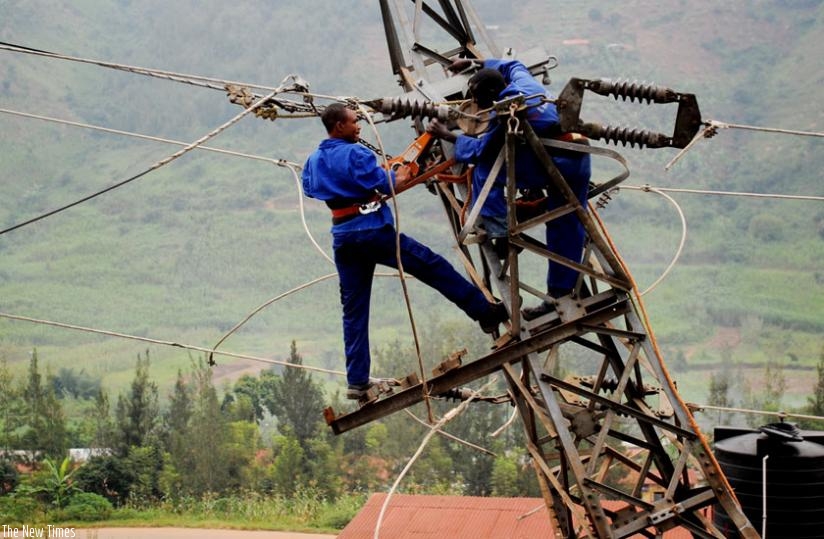 Workers of REG fix electric cables. Those laid off are claiming benefits. (File)