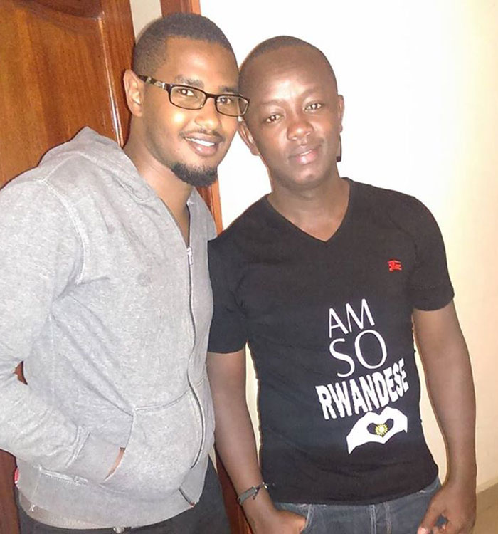 Muyango (in eye glasses) poses with one of his clients who is donning his brand T-shirts. (Courtsey)