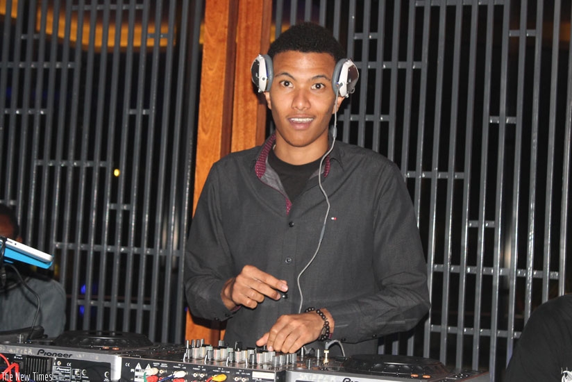 DJ Toxxyk behind the decks for a Heineken event at Chillax Lounge in Nyarutarama. (Moses Opobo)