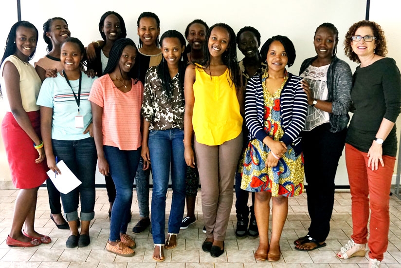 Scholars posing with the founder of SHE CAN, Barbara Bylenga (far right). 