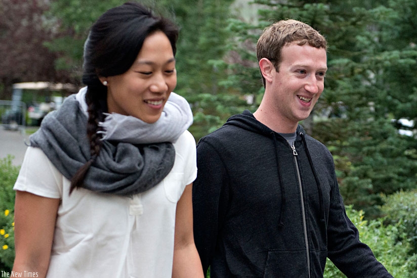 Mark Zuckerberg, chief executive officer and founder of Facebook Inc., walks with his wife Priscilla Chan. (Net photo)