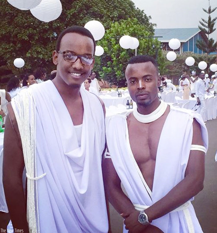 Moses Turahirwa (right) in Umwitero at Diner en Blanc with a friend. (Courtesy)