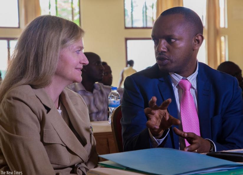 Amb. Barks-Ruggles (L) chats with Nzamukwereka during the conference yesterday. (F. Niyigena)
