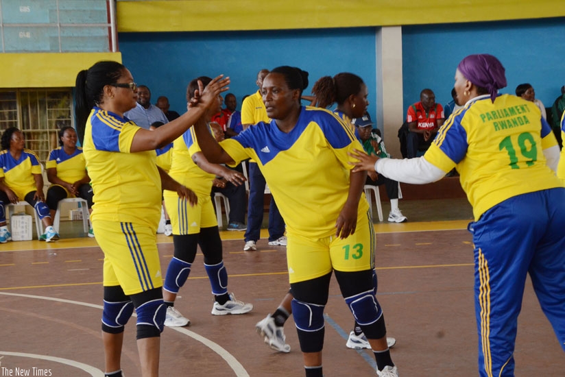 Rwanda women parliamentary volleyball team players celebrate after winning a point in the final against Kenya. (S. Ngendahimana)