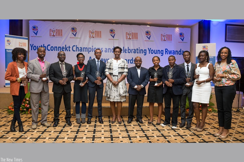 First Lady Jeannette Kagame (C), Minister for Youth and ICT Jean-Philbert Nsengimana with the awardees. The award gala was initiated 5 years ago by Imbuto Foundation, through the foundation's Youth Empowerment and Mentorship Programme. (Village Urugwiro)