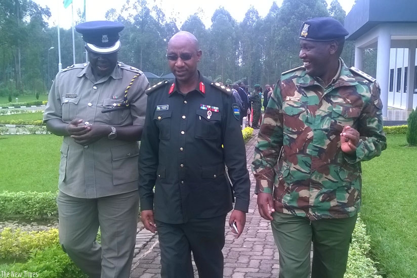 Col Rutaremara chats with officials attending the civilians protection course at RPA headquarters in Musanze. (Jean du2019Amour Mbonyinshuti)