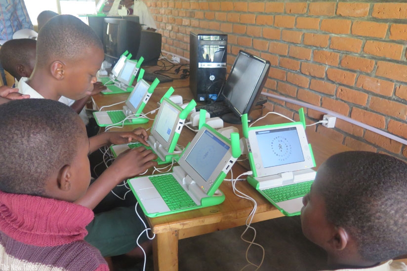 Pupils use laptops to study. Plans were made to revamp the One Laptop per Child Programme. (All photos by Solomon Asaba)