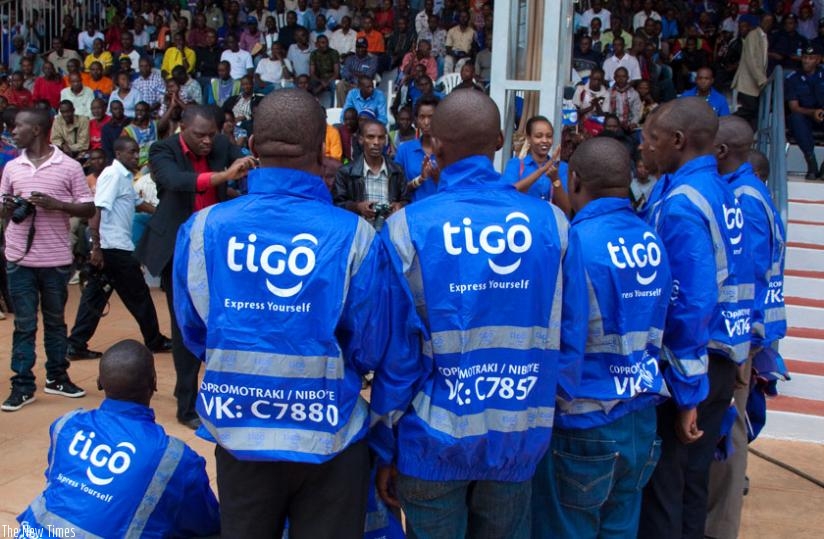 Commercial motorcyclists after receiving Tigo-branded reflector jackets. (File)