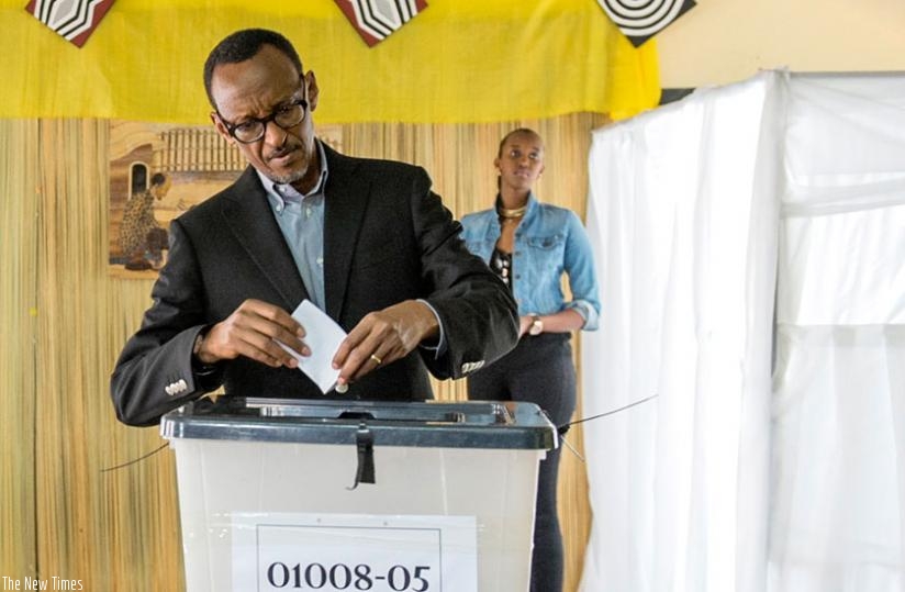 President Kagame casts his vote at APE-Rugunga polling station in Kigali yesterday. (Village Urugwiro)