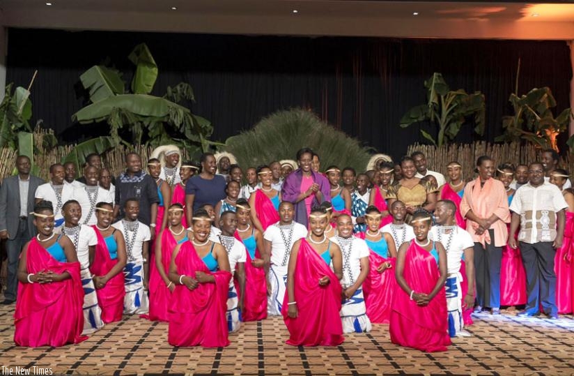 First Lady Jeannette Kagame (C) poses for a photo with officials and Urukerereza members at the cultural evening gala yesterday. (Courtesy)