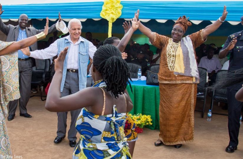 Minister Mukantabana and Saber join Burundian refugees in a traditional dance during festive celebrations at Mahama camp on Wednesday. (Doreen Umutesi)