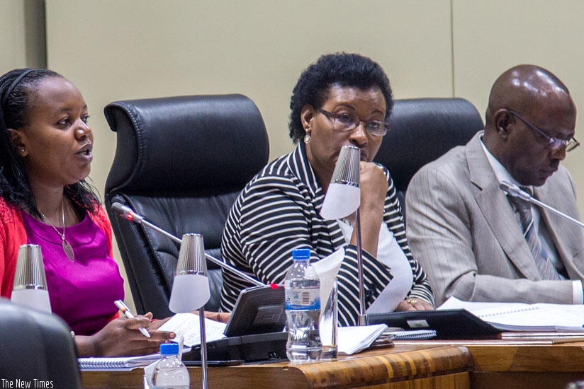 The Deputy Speaker of Parliament in charge of Legislation, Jeanne d'Arc Uwimanimpaye (L), explains the changes to different articles in the Constitution as Donatille Mukabalisa, the Speaker of Parliament, and Mukama Abbas, Deputy Speaker in charge of finance and administration look on, on October 28. (File)