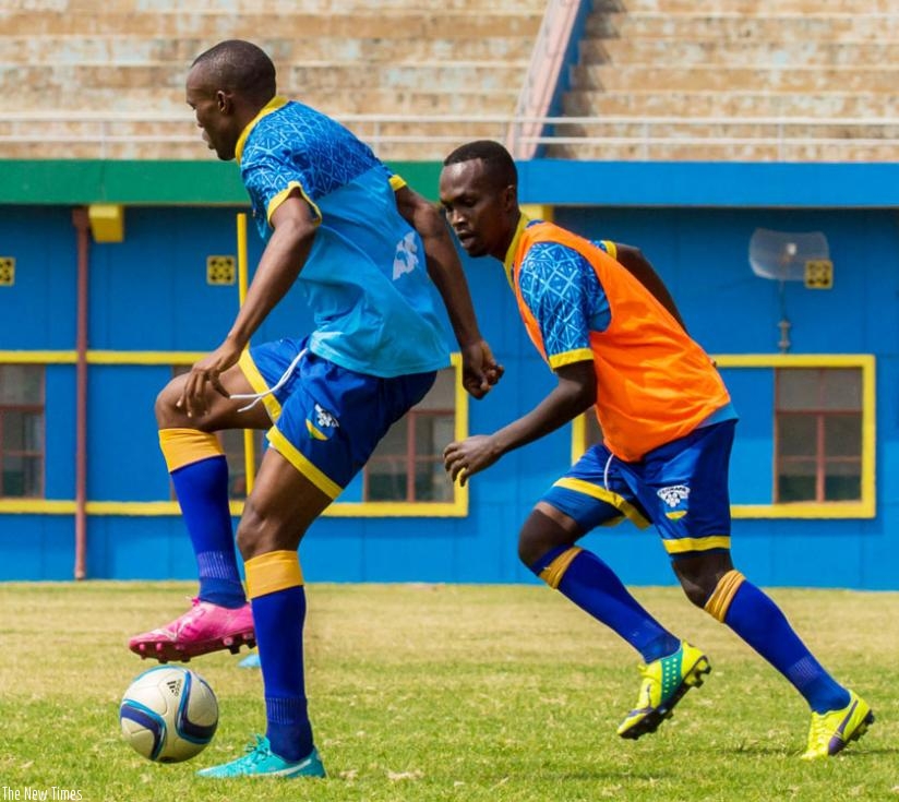 Rwanda CHAN team captain Jacques Tuyisenge (L), says Amavubi players are determined to do well in front of their home fans. (File)