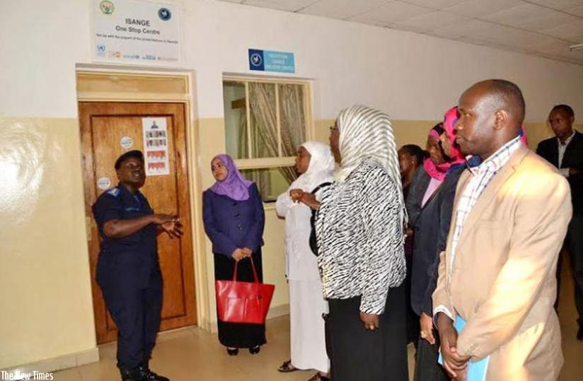 A Police officer shows visiting Zanzibar legislators around Isange One Stop Centre at the Police Hospital in Kacyiru last year. (File)