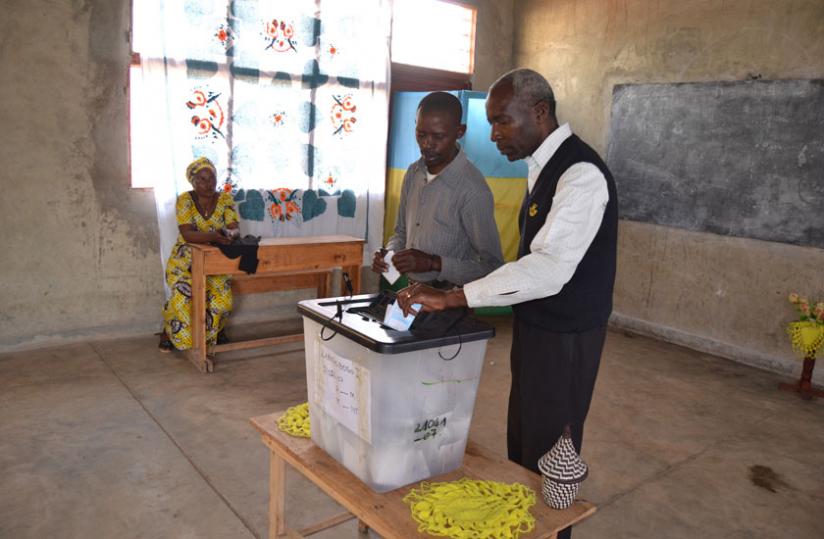 Voters exercise their right in Musanze District during the constitutional referendum poll last month. (Jean d'Amour Mbonyinshuti)