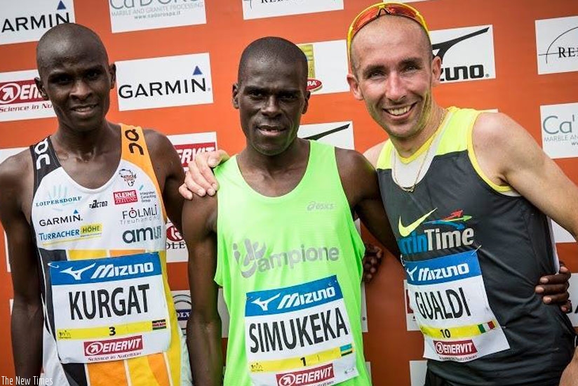 Jean Baptiste Simukeka (C) after the Reggio Emilia marathon last month. (Courtesy)