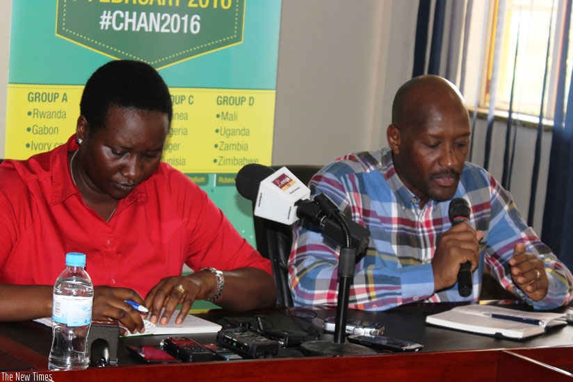 Minister Uwacu and FERWAFA president, Nzamwita addressing the press conference on Friday. (Courtesy)