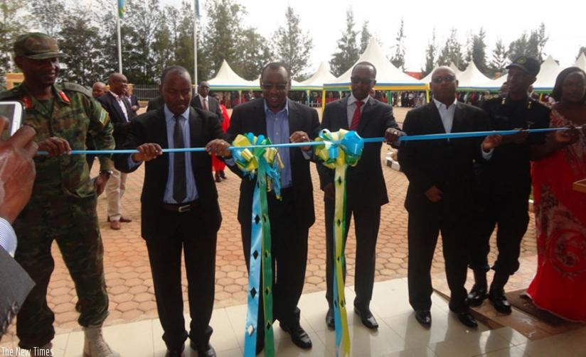 Finance Minister Amb. Gatete (3rd left) officially inaugurates Kamonyi District Headquarters on Friday. (Michel Nkurunziza)