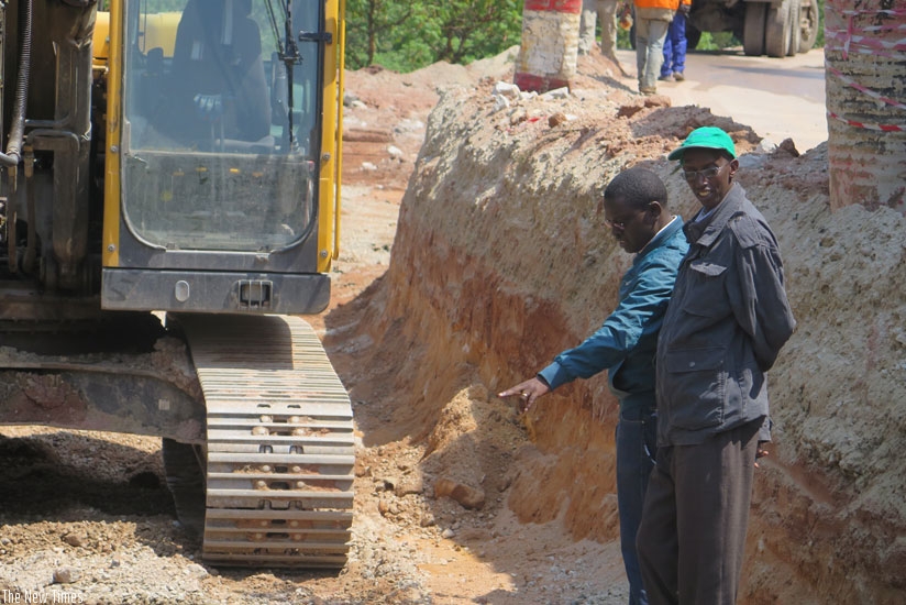 Contractors assess road works. The countryu2019s import bill rose to Rwf370.4 billion over the third quarter of last year. (File)