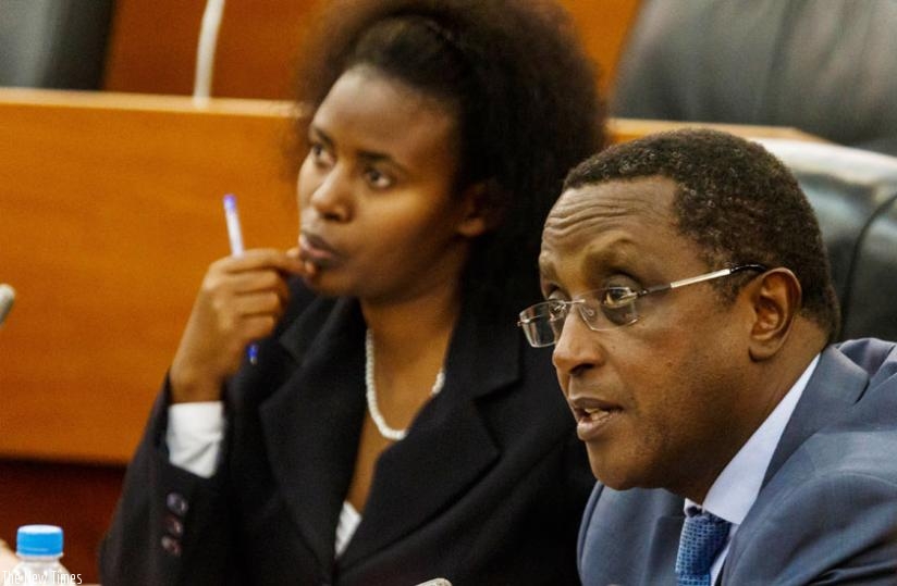 The Minister for Natural Resource, Dr Vincent Biruta, explains the state of forestry to senators as Adrie Mukashema, the deputy director in charge of forestry management at Rwanda Natural Resources Authority, looks on. (T. Kisambira)