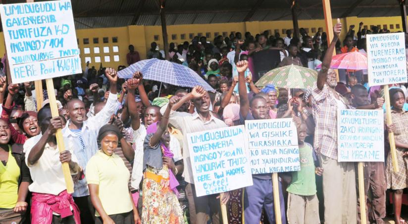 Residents of Busasamana Sector take part in a discussion on constitutional amendment at Nyanza Stadium last year. (File)