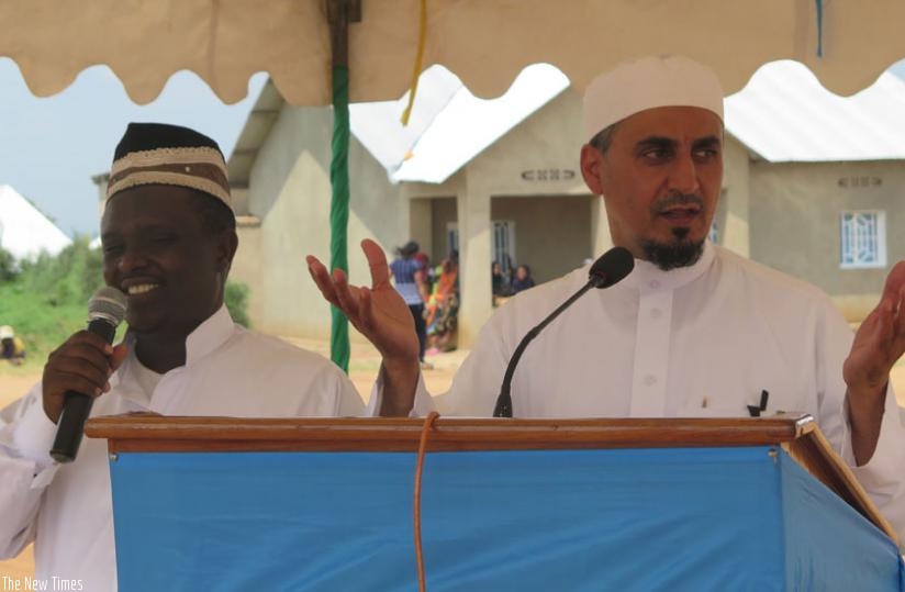 Zaidi (R) speaks during the inauguration of the projects in Nyanza as Sheikh Kabiriti interprets for him on Tuesday.  (E. Ntirenganya)