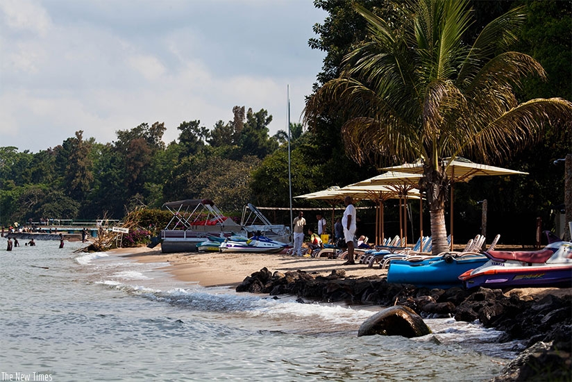 People relax at Kivu Serena beach in Gisenyi, Rubavu District. (Courtesy)