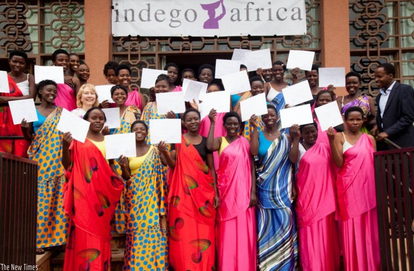 The graduates display their certificates. (Ferrand Ndayisaba)