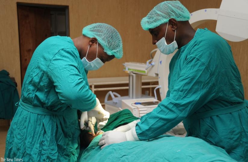 Doctors perform an operation at Rwanda Military Hospital, Kanombe. Persons engaged in the health sector have been urged to enhance coordination for improved service delivery. (File)
