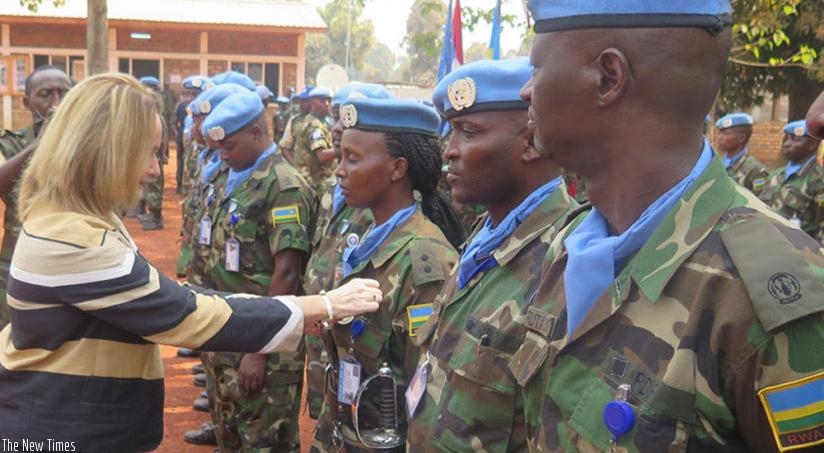 Rwandan contingent (RWABATT 2) officers being decorated. (Net Photo)