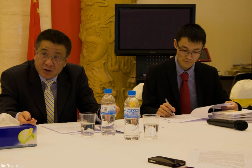 Amb. Pan (L) briefs the media about the upcoming spring festival on Thursday. (Teddy Kamanzi)