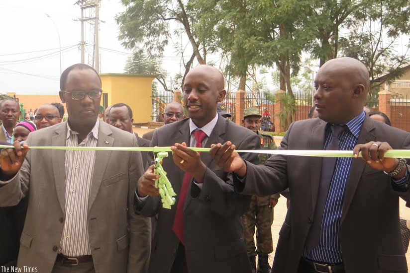 L-R; Ndayisaba, Kaboneka and Ndamage inaugurate the complex. (Frederic Byumvuhore)